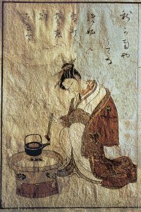 История чая. Японка готовит воду для чая. Ксилография